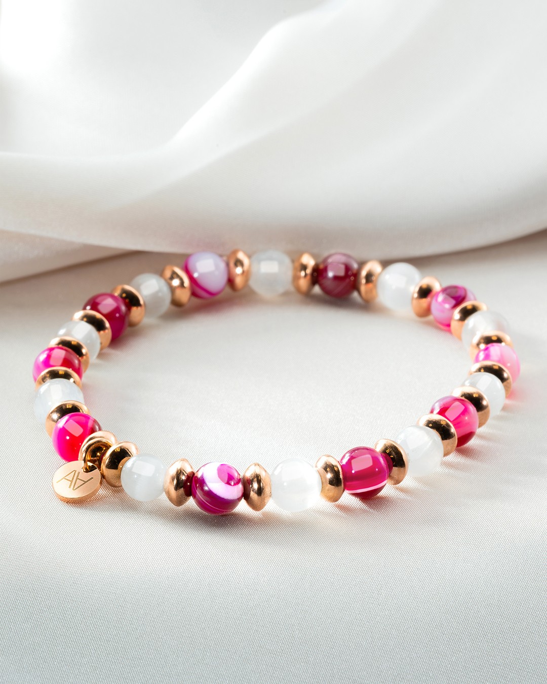 Packshot Armband rosa Achat und Selenit.Wohlwollen in Beziehungen