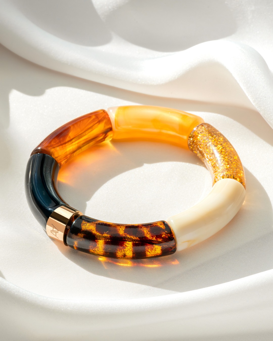 Packshot Armband Herbstlichter Schwarz, Bernstein, Glitzer, Cremebeige und Leopard Cerreto